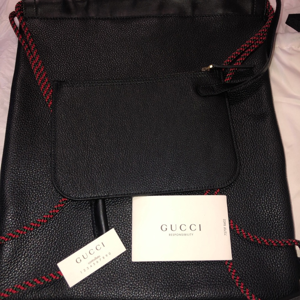 Authentic Gucci Logo Leather Drawstring Backpack - Picture 2 of 4